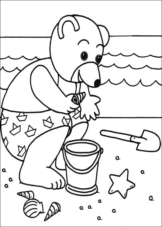 coloriage petit ours brun ramasse des coquillages